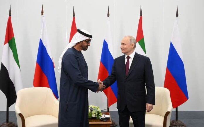 Russian President Vladimir Putin and President of the United Arab Emirates Sheikh Mohammed bin Zayed Al Nahyan shake hands during a meeting at the St. Petersburg International Economic Forum (SPIEF) in Saint Petersburg, Russia, June 16, 2023. Photo: Sputnik/Ilya Pitalev.